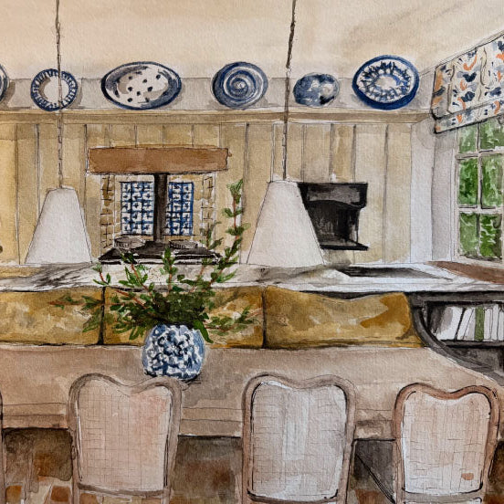Dining room with wooden table, chairs, and decorative plates on the wall.